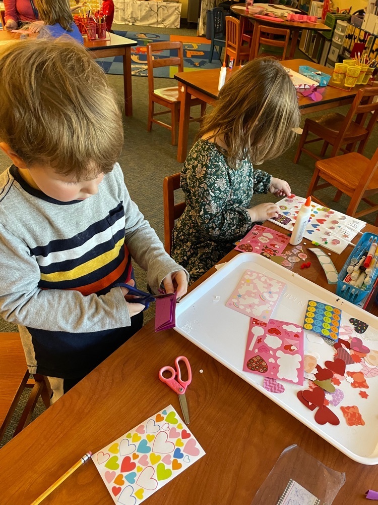 kindergarten working on Valentine’s Day art